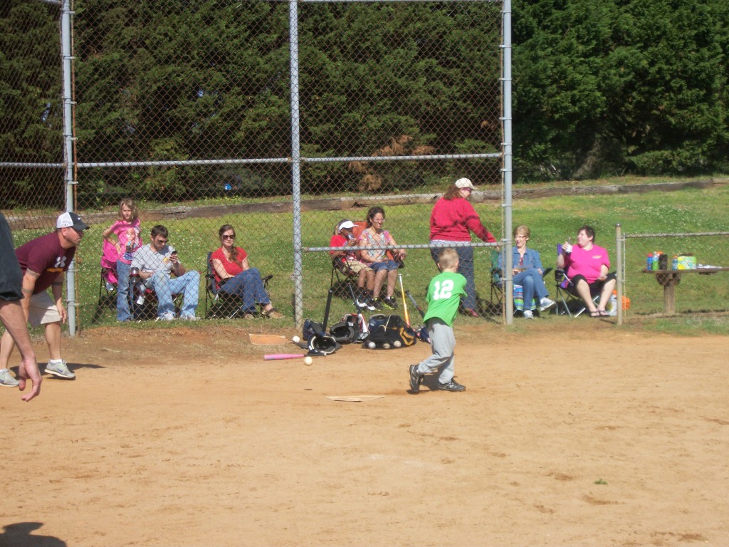 They tried coach pitch today at T-ball, and Adam was swinging for the fences!